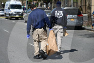 61-year-old Woman Fatally Shot To The Head And A 23-year-old Man Wounded After Being Shot To The Foot At West 113 Street And Lenox Avenue In Harlem, Manhattan, New York