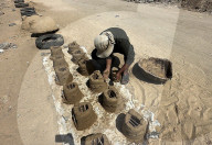 Gazans manufacture clay ovens for cooking