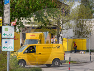 DHL Operations By A Post Office And DHL Packstation