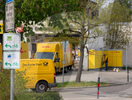 DHL Operations By A Post Office And DHL Packstation