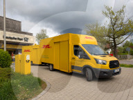 DHL Operations By A Post Office And DHL Packstation