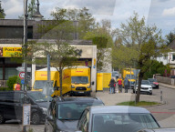 DHL Operations By A Post Office And DHL Packstation