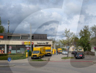 DHL Operations By A Post Office And DHL Packstation