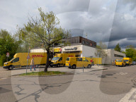 DHL Operations By A Post Office And DHL Packstation