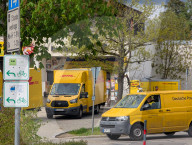 DHL Operations By A Post Office And DHL Packstation