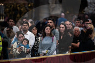 Catholics Pay Their Respects To Pope Francis As He Lies In State