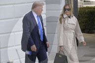 DC: President Trump and First Lady Melania Trump hold a White House departure