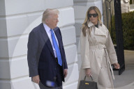 DC: President Trump and First Lady Melania Trump hold a White House departure