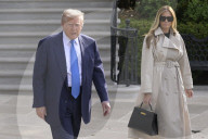 DC: President Trump and First Lady Melania Trump hold a White House departure