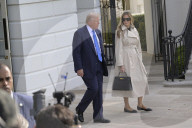 DC: President Trump and First Lady Melania Trump hold a White House departure