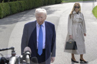 DC: President Trump and First Lady Melania Trump hold a White House departure