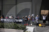 Protesters Demonstrate Outside Elite Law Firm Over Deal With Trump