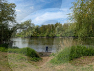 Man Alone By A River