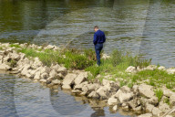 Man Alone By A River