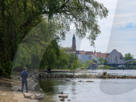 Man Alone By A River