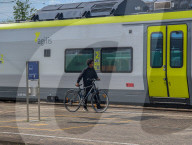 Man With Bicycle At A Train Station In Bavaria