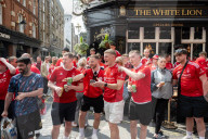Football fans in Covent Garden, London, UK