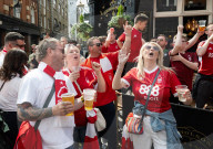 Football fans in Covent Garden, London, UK