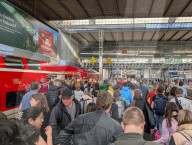 Travelers Disembark From Regional Express RE 1 From Nuremberg At Munich Central Station