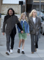 Dave Grohl, 56, puts his love child drama to one side as he enjoys a tender family day out with wife Jordyn Blum and all of their daughters.