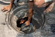 Municipal Workers Clean Dhaka Sewers Ahead Of Monsoon