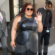 Da'Vine Joy Randolph is seen in a black leather dress outside Live with Kelly & Mark in New York City