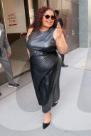 Da'Vine Joy Randolph is seen in a black leather dress outside Live with Kelly & Mark in New York City