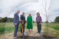 Charles and Camilla plant a tree with with King & Queen of Sweden