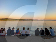 Youths At Sunset By Lake Starnberg