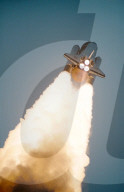 Space Shuttle Discovery Lifts Off