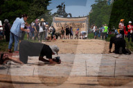 People sign giant U.S. Constitution premable outside White House