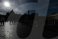 Tourists In St. Peter's Square Before The Conclave .