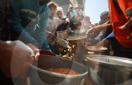 Palestinians Receive Free Food From Food In Gaza City