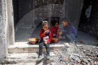 Palestinians Receive Free Food From Food In Gaza City