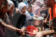 Palestinians Receive Free Food From Food In Gaza City