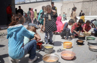 Palestinians Receive Free Food From Food In Gaza City