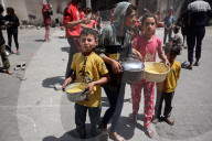 Palestinians Receive Free Food From Food In Gaza City