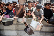 Palestinians Receive Free Food From Food In Gaza City