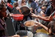 Palestinians Receive Free Food From Food In Gaza City