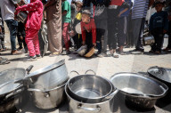 Palestinians Receive Free Food From Food In Gaza City
