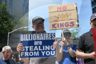 Anti-Tesla And Anti-Elon Musk Protest In Front Of Tesla Showroom At 860 Washington Street
