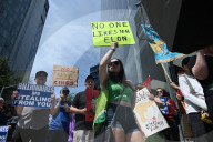 Anti-Tesla And Anti-Elon Musk Protest In Front Of Tesla Showroom At 860 Washington Street
