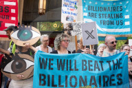 Protesters Rally At Tesla Dealership And March To Billionaires’ Offices In Manhattan