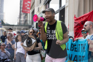 Protesters Rally At Tesla Dealership And March To Billionaires’ Offices In Manhattan