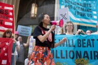Protesters Rally At Tesla Dealership And March To Billionaires’ Offices In Manhattan