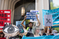 Protesters Rally At Tesla Dealership And March To Billionaires’ Offices In Manhattan