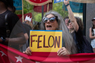 Protesters Rally At Tesla Dealership And March To Billionaires’ Offices In Manhattan