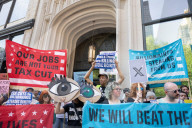 Protesters Rally At Tesla Dealership And March To Billionaires’ Offices In Manhattan