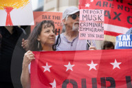 Protesters Rally At Tesla Dealership And March To Billionaires’ Offices In Manhattan