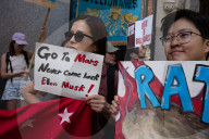 Protesters Rally At Tesla Dealership And March To Billionaires’ Offices In Manhattan